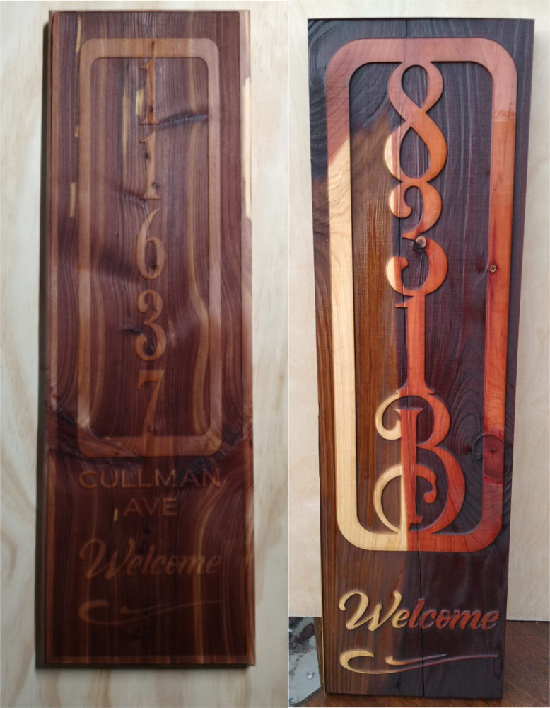 Two custom wooden address signs made by AduroMark